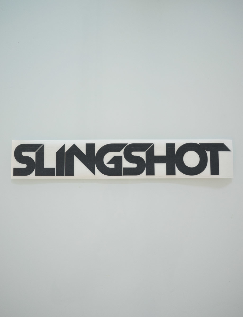Slingshot Schriftzug Aufkleber schwarz 29cm - SLINGSHOT Deutschland